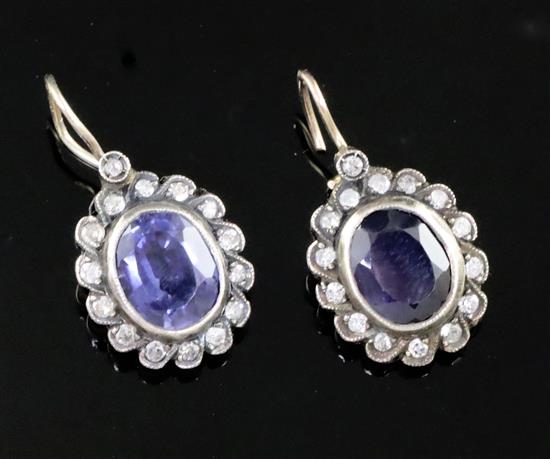 A pair of early 19th century, gold and silver, sapphire and diamond set oval cluster earrings, (ear wire a.f.), gross 6.2 grams.